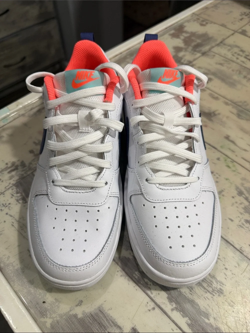 Nike White Low-Top Sneakers with Navy Swoosh & Coral-Pink Lining